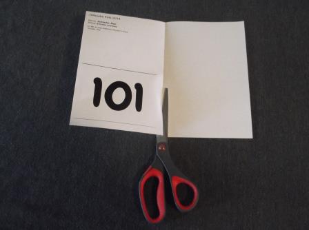 Number card being cut